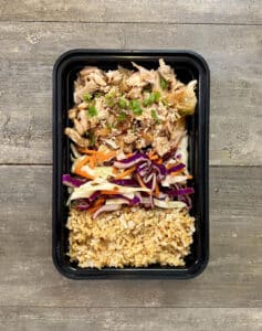 A meal prep dish of Teriyaki Rotisserie Chicken