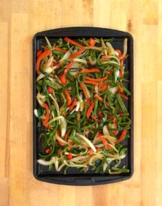 Chipotle Fajita Vegetables batch prepped on a tray.